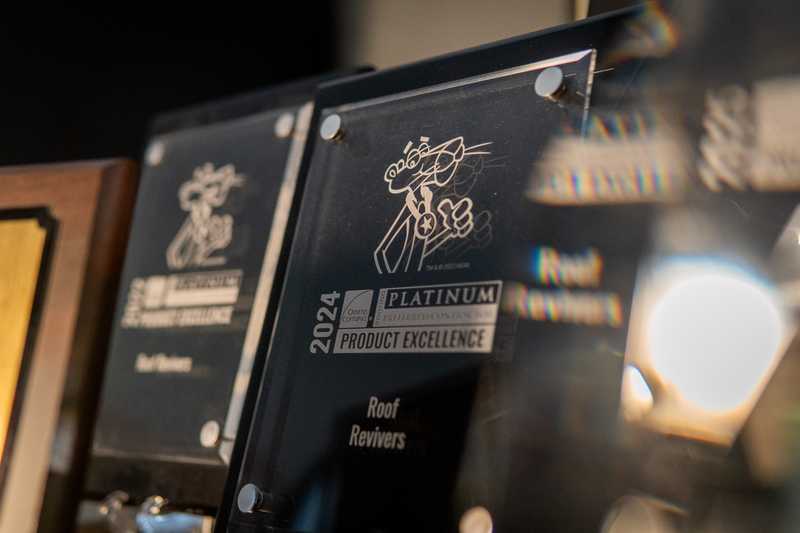 A closeup of some of Roof Revivers' awards.