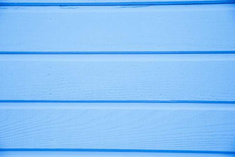 Hurricane-rated fiber cement siding installation showing wind and impact resistance in Cary