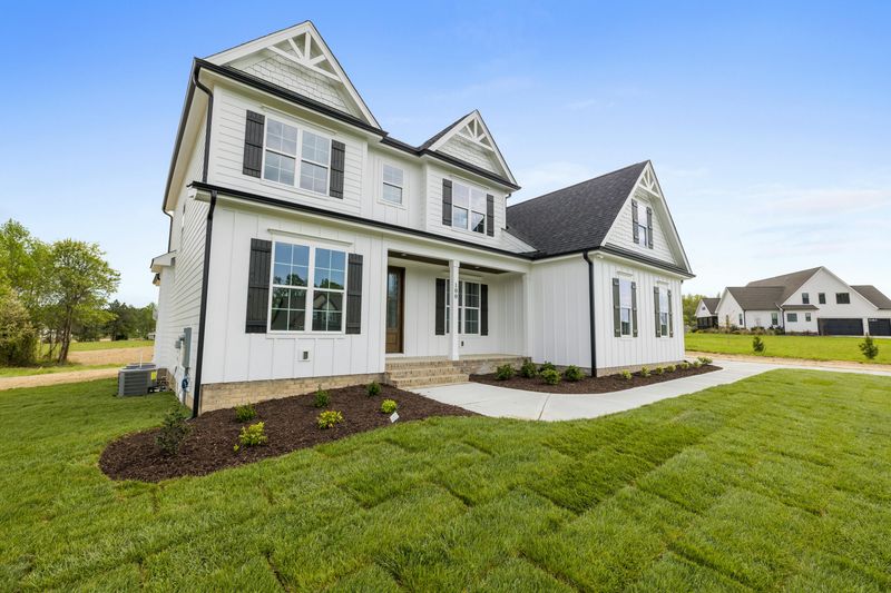 Homeowner reviewing transparent siding installation estimate with contractor in Apex, North Carolina