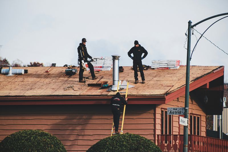 Modern roof repair team using drone inspection and thermal imaging technology for precision repairs in Apex