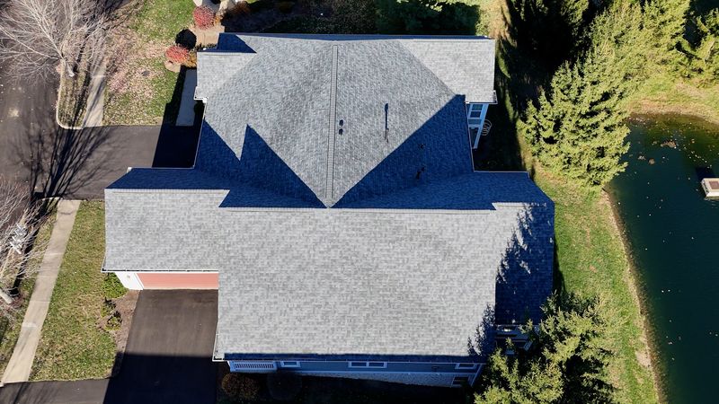 Storm damaged roof replaced and repaired by Roof Revivers of Columbus, Ohio.