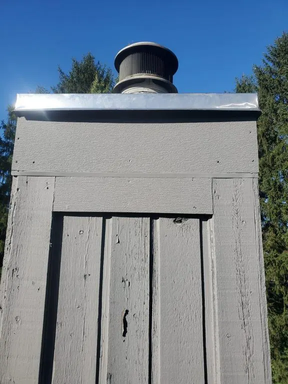 Repaired chimney chase top and trim in Columbus, Ohio