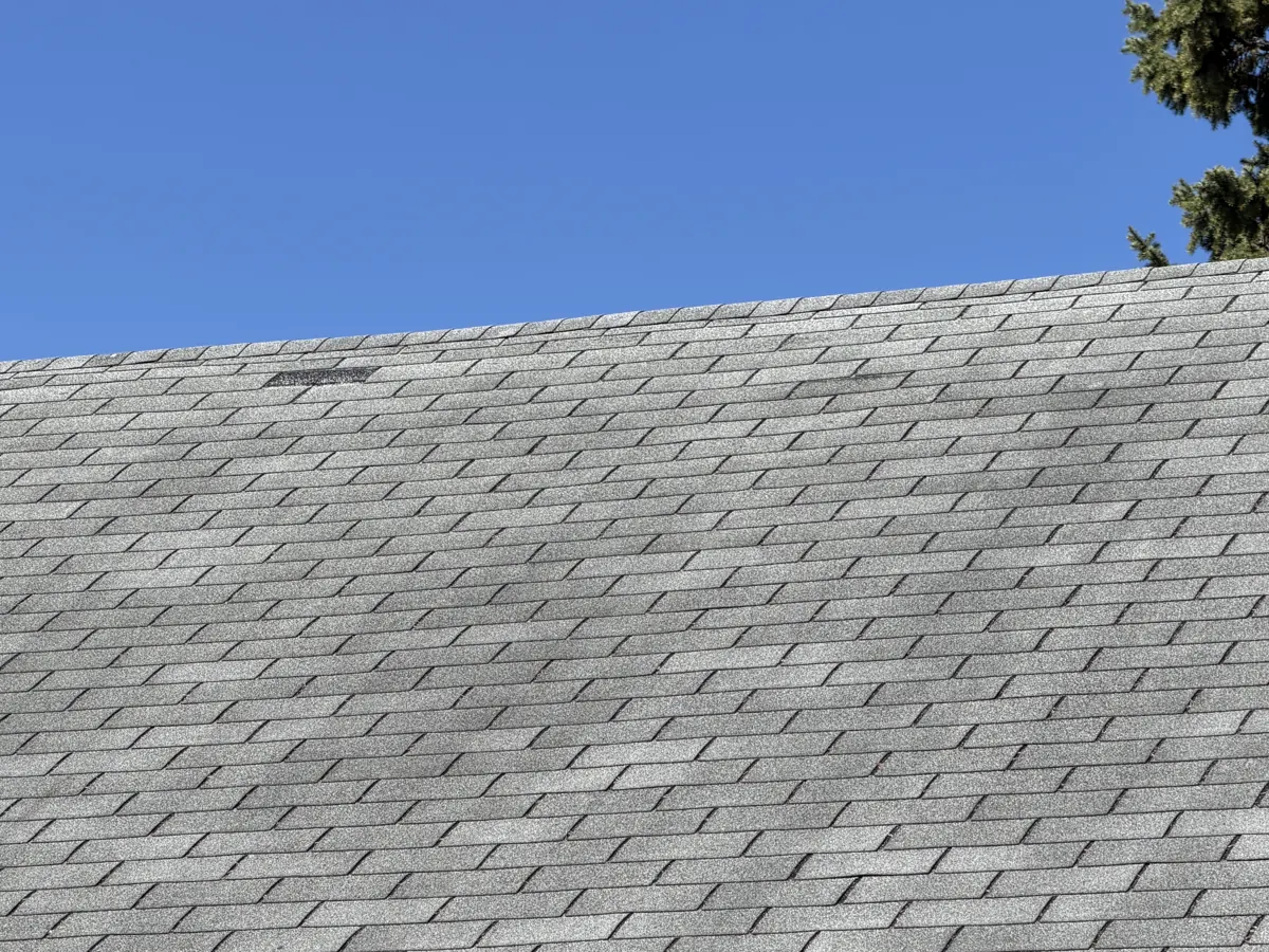 Worn two-layer asphalt shingle roof on a Columbus, Ohio home, before replacement
