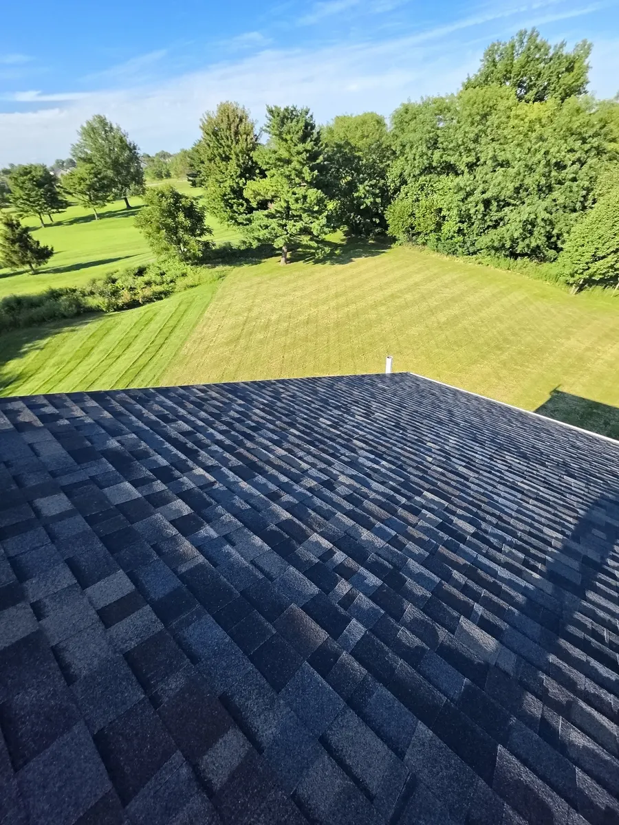 New Owens Corning Duration FLEX shingles in Black Sable on the back slope of a Delaware, Ohio home, after roof replacement
