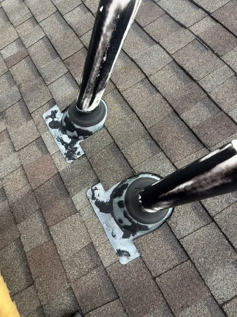 Old pipe flashings exposed during a Dublin, Ohio pipe boot repair