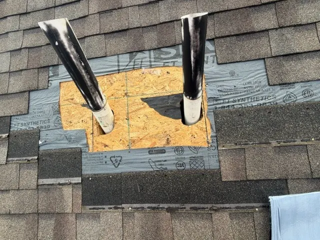 New decking around two vent pipes during a Dublin, Ohio repair