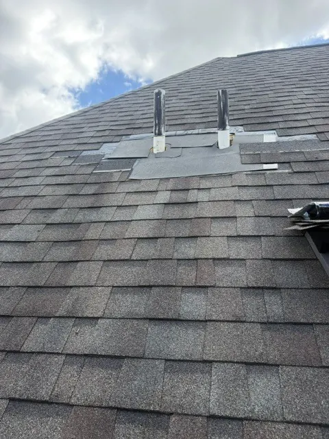 New pipe flashings shingled in on a Dublin, Ohio roof