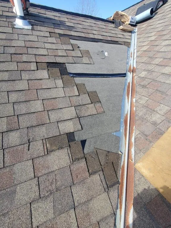 Shingles going back in along the valley during a Hilliard, Ohio repair