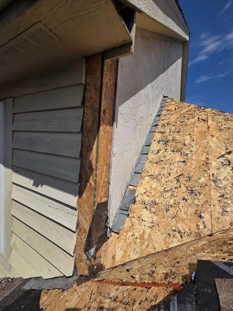 Old trim removed and new decking in place at the wall on a Powell, Ohio home