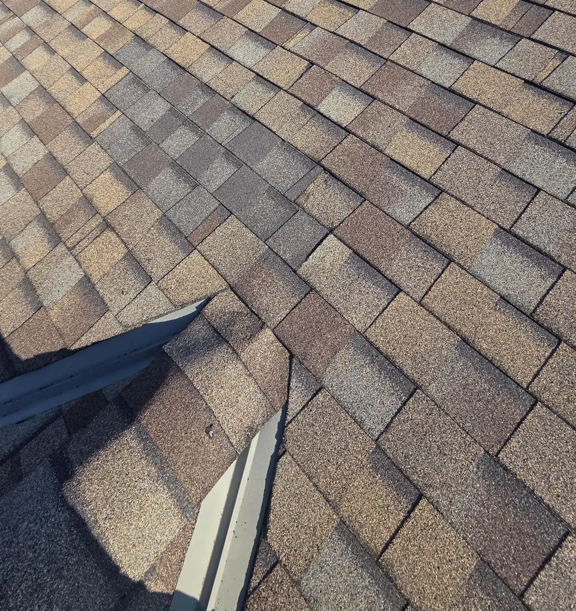 The same roof area in Reynoldsburg, Ohio with the damaged shingles replaced, after repair