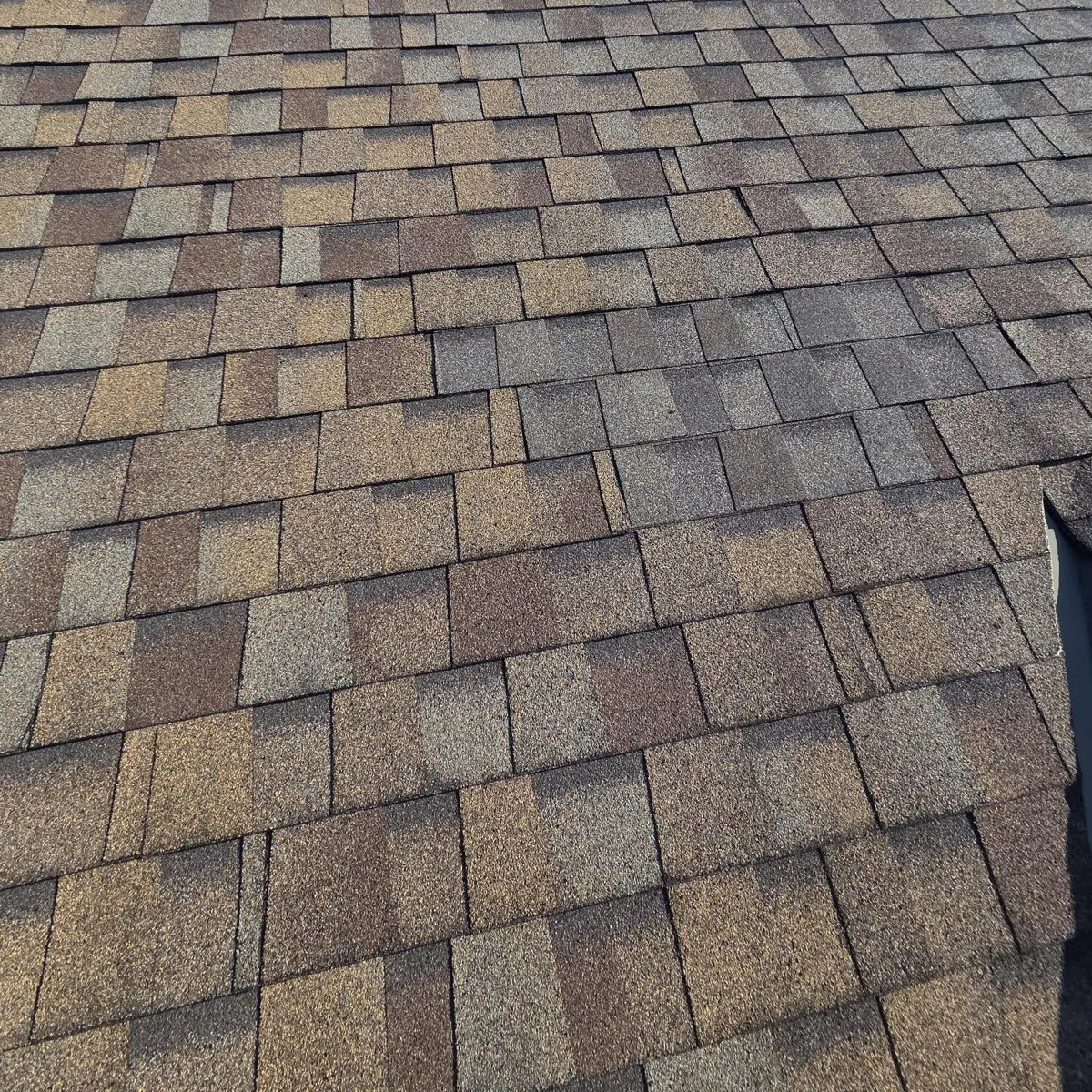 Shingled roof slope in Reynoldsburg, Ohio after the storm damage repair