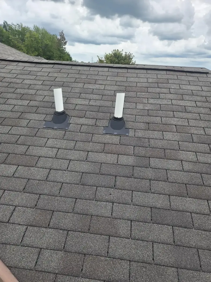 Two new pipe boots and shingles on a Westerville, Ohio roof, after replacement