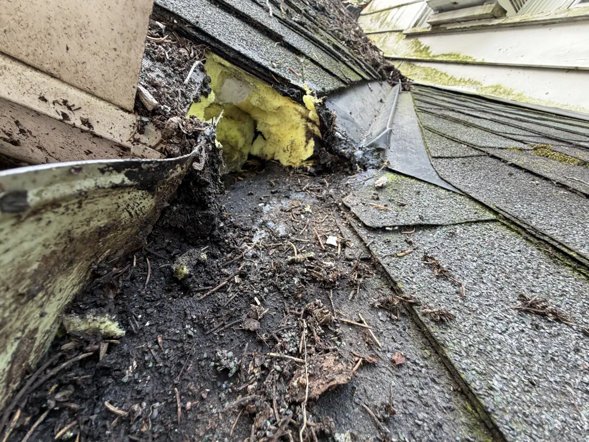 Rotted wood at an inside roof corner in Westerville, Ohio, before repair