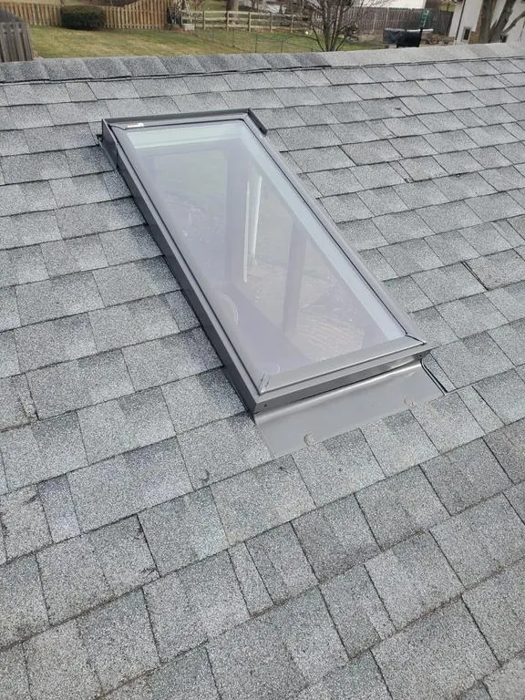 New skylight flashed and shingled in on a Westerville, Ohio roof